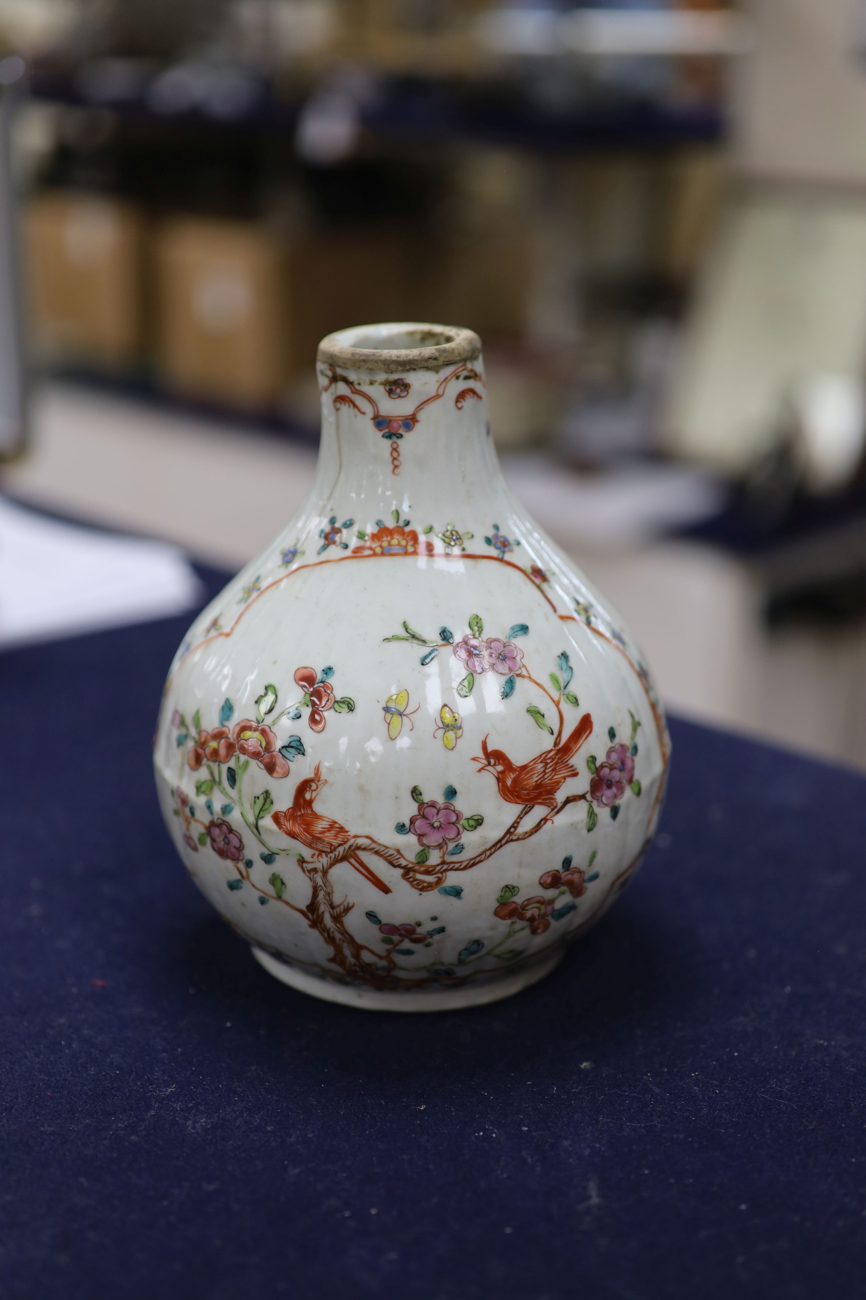 A Chinese Qianlong period bottle vase, reduced, height 29.5cm, and a Chinese plate with signature on back